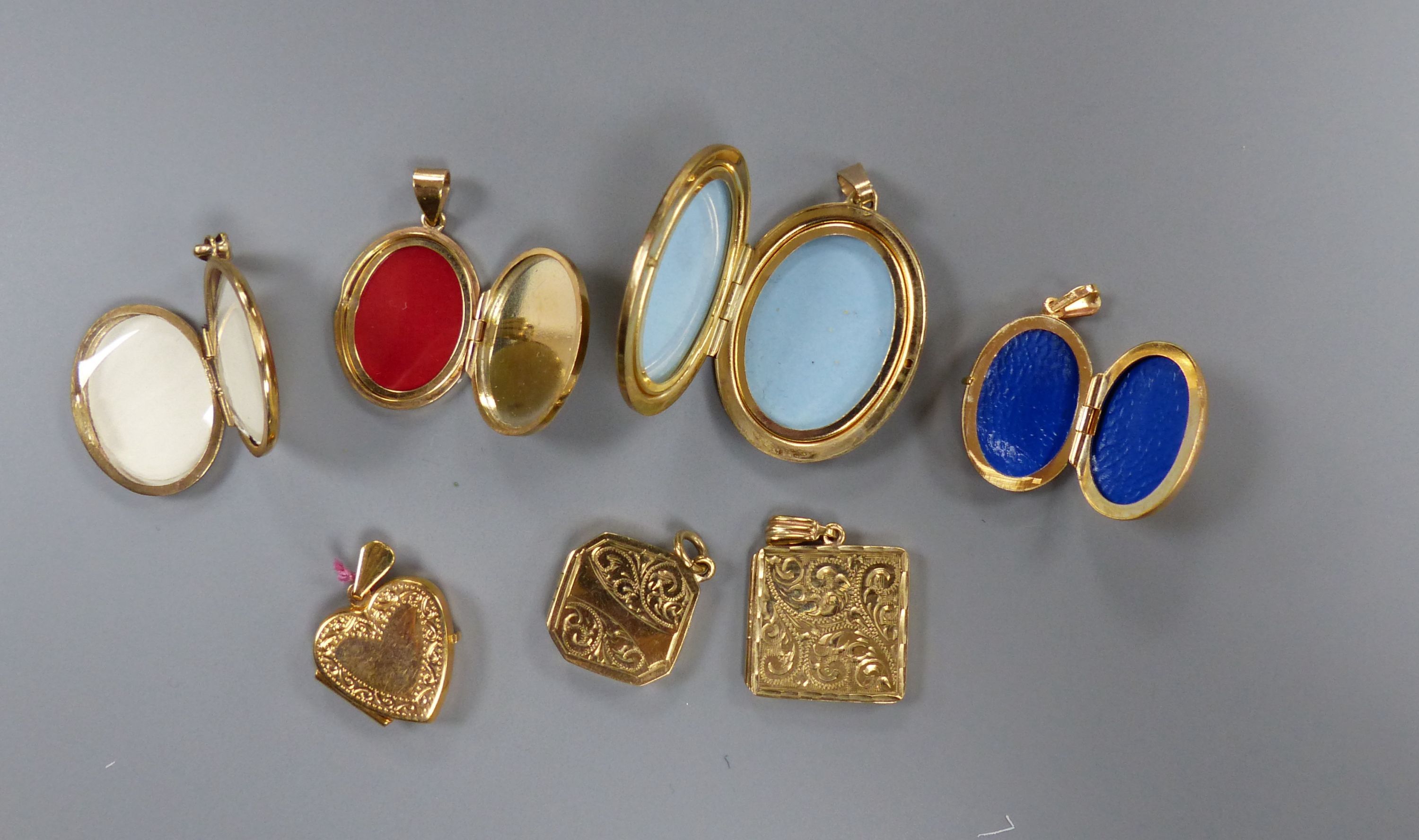 Seven assorted modern 9ct gold lockets, largest 32mm,
